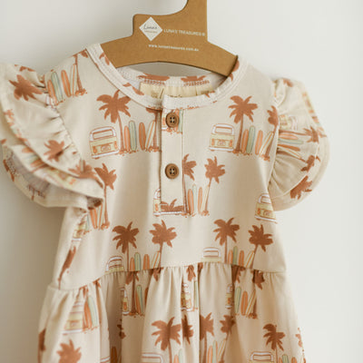 Girls organic cotton flutter short sleeve dress with earthy tones, super cute combi wagon, palm trees and longboard surfboards.